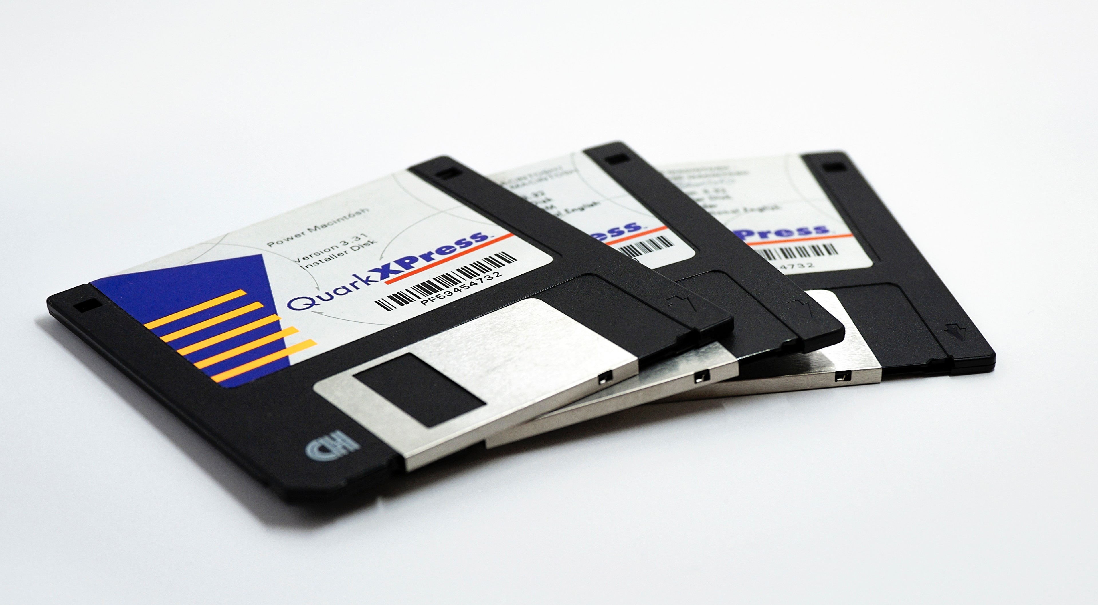 Three Quad Xpress Diskettes by Brett Jordan on Unsplash